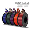 Five spools of Silk PLA filament in various colors with temperature information on a white background.