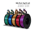 Five spools of Silk PLA filament in different colors with decorative dragons on a white background.