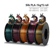 Five spools of Silk PLA filament with colorful dragon models on a white background