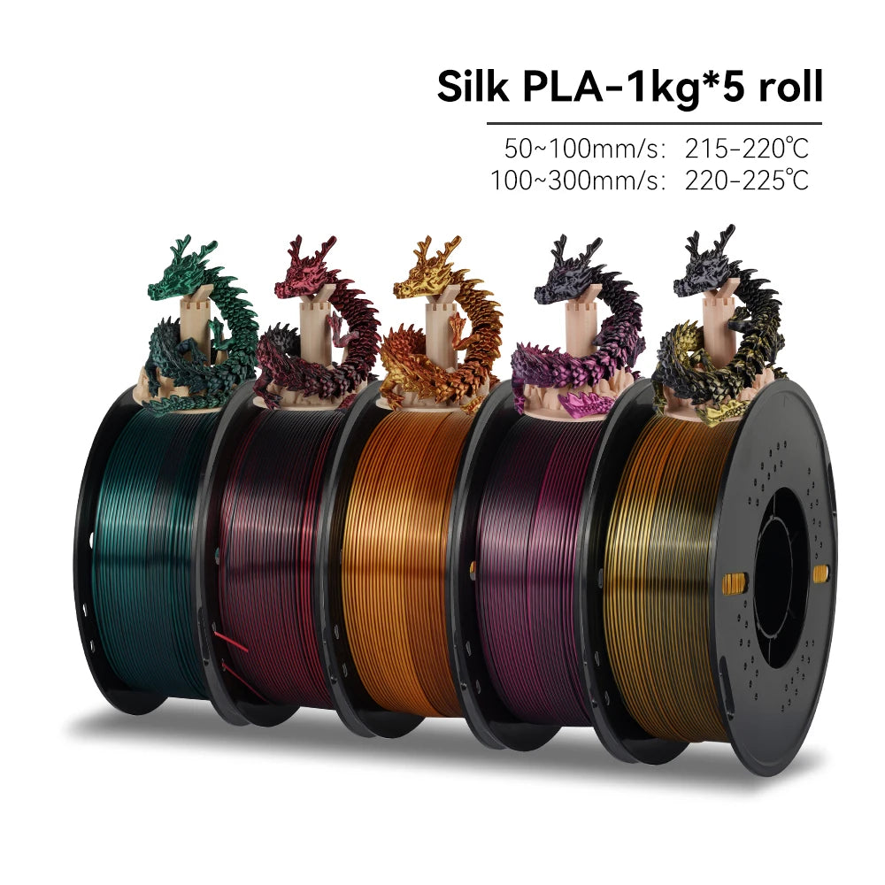 Five spools of Silk PLA filament with colorful dragon models on a white background