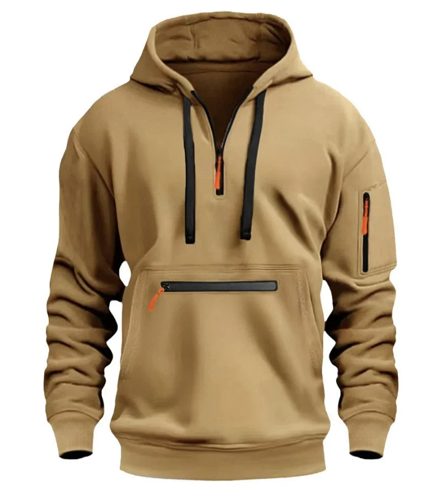 Tan hoodie with black and orange accents on a white background