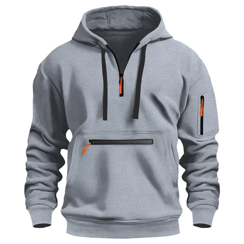 Gray hoodie with black and orange zippers on a white background