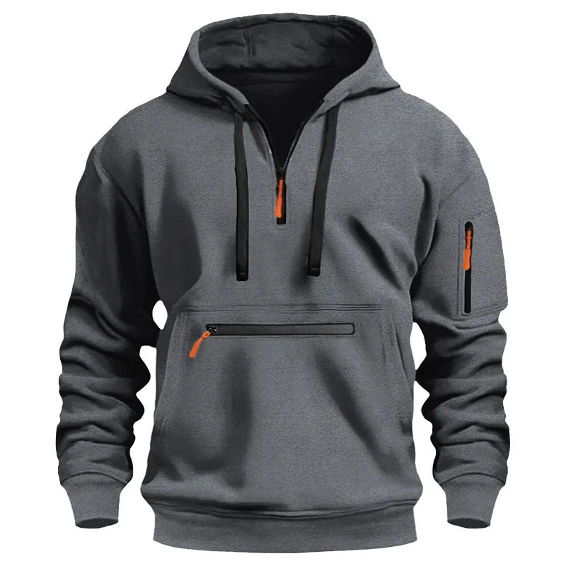 Gray hoodie with black and orange zippers on a white background
