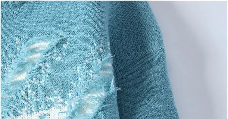 Close-up of a blue textured fabric with a blurred background