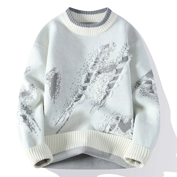 Light blue sweater with snowflake pattern on a white background
