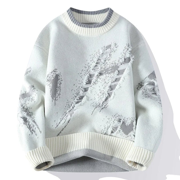 Light blue sweater with snowflake pattern on a white background