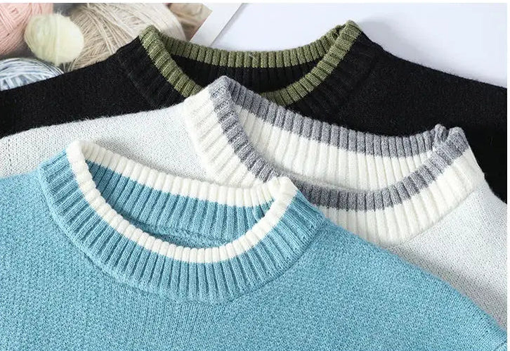 Four sweaters with different collar colors on a white background