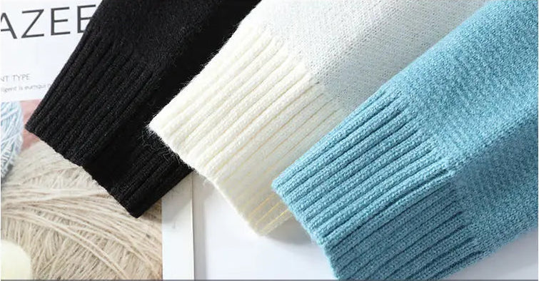 Three knitted sleeves in black, white, and blue on a magazine background.