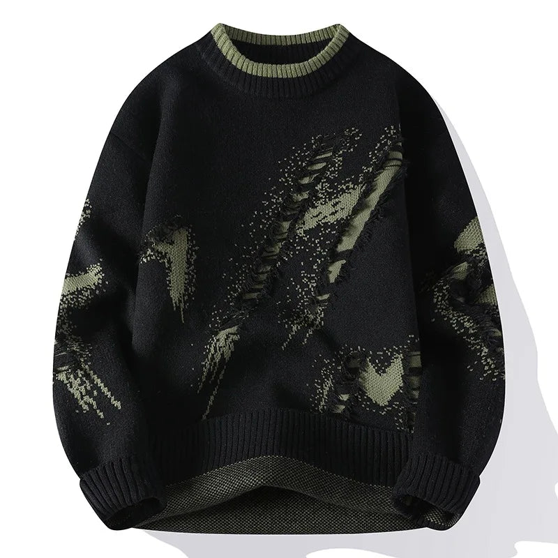 Black sweater with green pattern on a white background