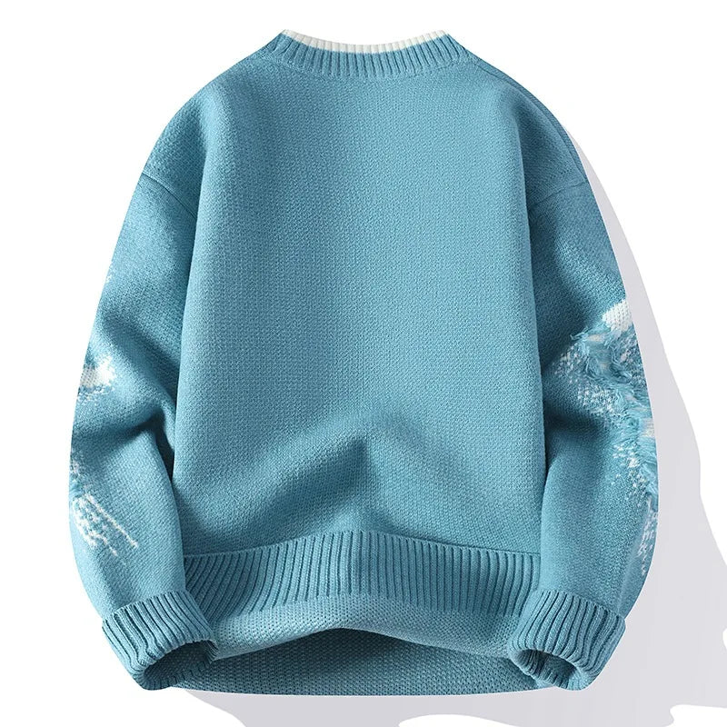 Blue sweater with white distressed patterns on a white background