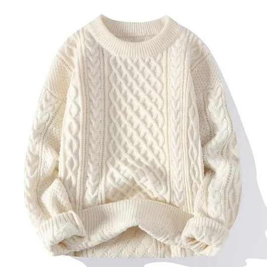 White cable knit sweater on a white background