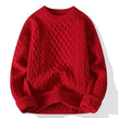 Red knitted sweater on a white background