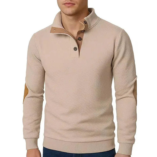 Beige long-sleeve shirt with button details on a white background