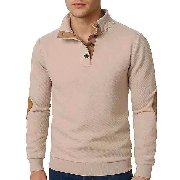 Beige long-sleeve shirt with button details on a white background