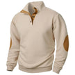 Beige sweater with brown elbow patches on a white background