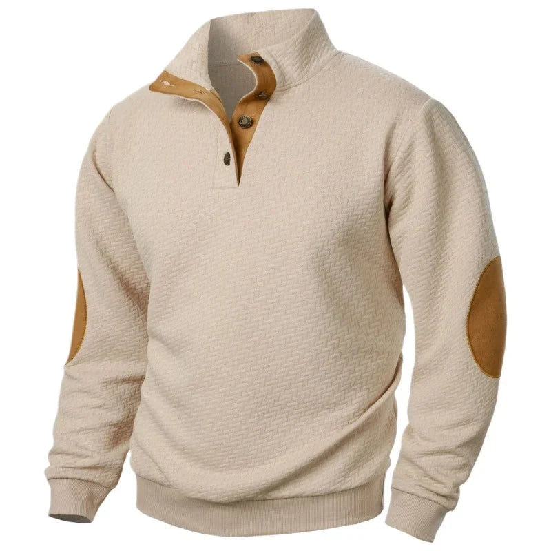 Beige sweater with brown elbow patches on a white background