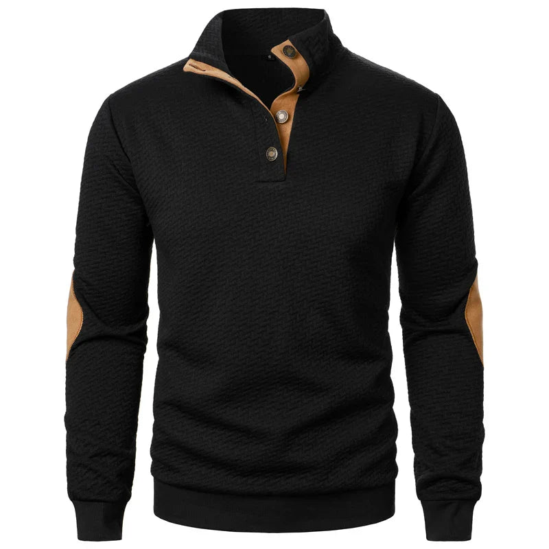 Black pullover with brown accents on a white background