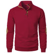 Red pullover with brown accents on a white background