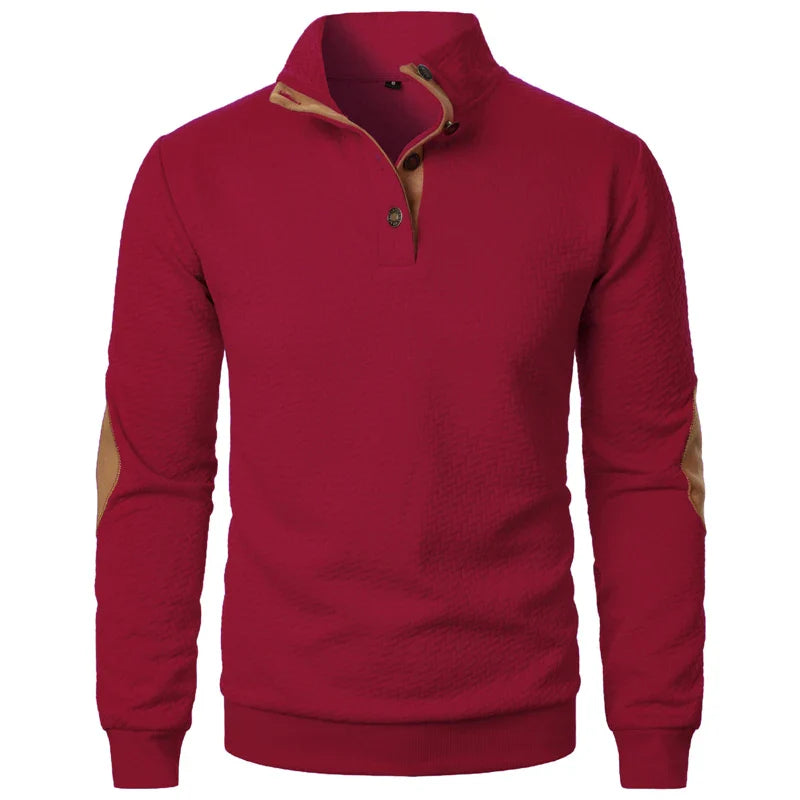 Red pullover with brown accents on a white background