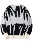 Sweater with black and white abstract pattern on a white background