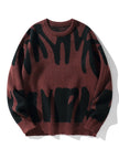 Brown sweater with black abstract pattern on a white background
