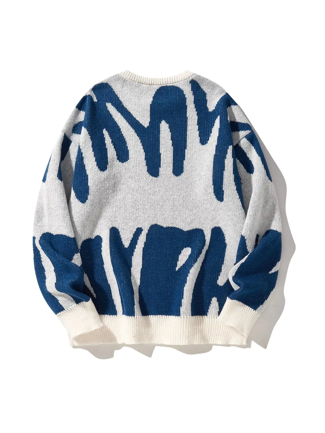 Sweater with blue and white abstract pattern on a white background