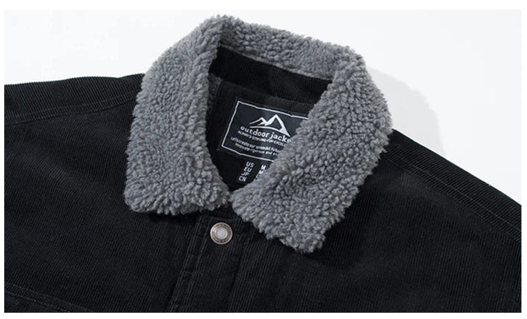 Black jacket with gray sherpa collar and Magcomsen logo on a white background