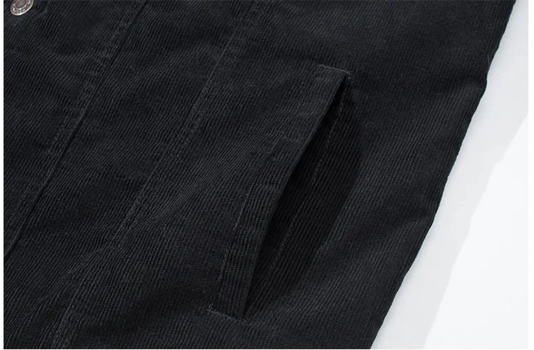 Close-up of a black fabric pocket on a white background
