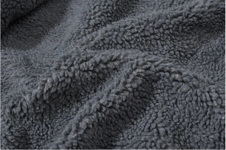 Close-up of a textured gray fabric surface
