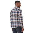 Man wearing a plaid shirt with Magcomsen logo on a white background