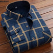Folded blue and beige checkered shirt on a wooden surface with 'Btsukimi' branding.