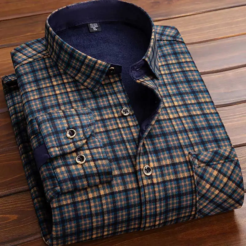 Folded plaid shirt on a wooden surface
