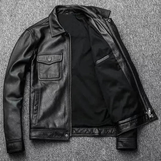 Black leather jacket on a textured gray background
