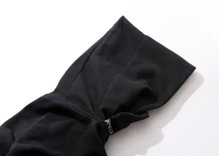 Black hooded garment on a mannequin head with a white background