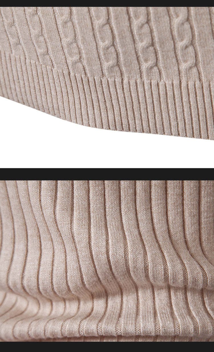 Close-up of beige textured fabric with a subtle pattern.