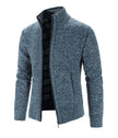 Blue knitted cardigan on a white background