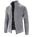 Gray knitted cardigan with plaid lining on a white background