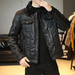 Black leather jacket worn by a person in an indoor setting