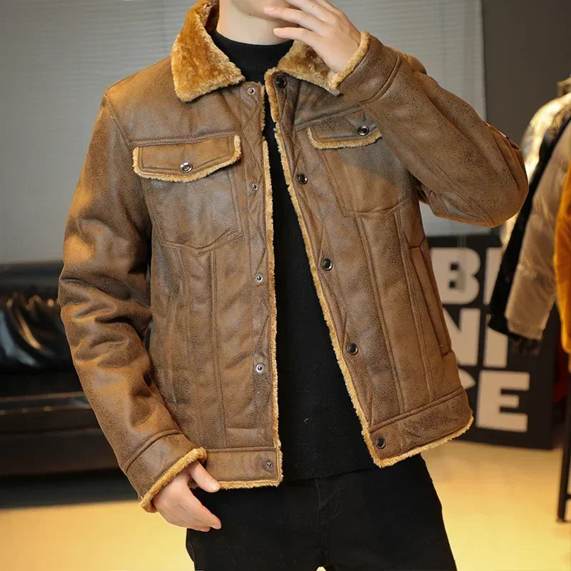 Brown leather jacket with fur trim worn by a person indoors.