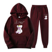 Maroon hoodie and pants set with teddy bear design on a white background