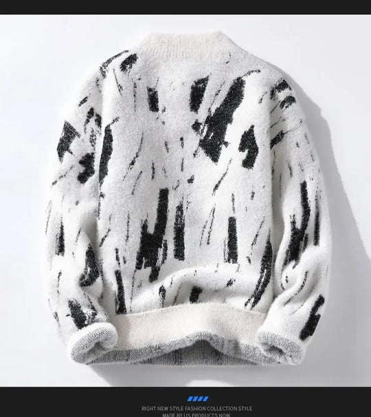 White sweater with black abstract pattern on a white background