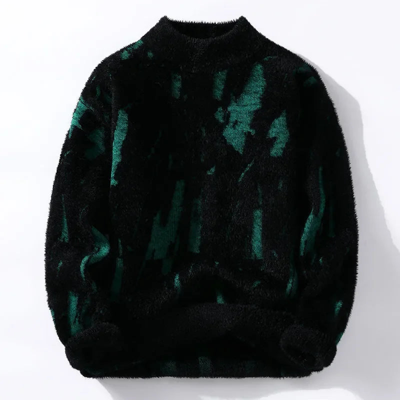 Black sweater with green butterfly pattern on a white background