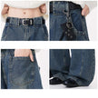Collage of close-up shots of blue jeans with a belt and black shoes.