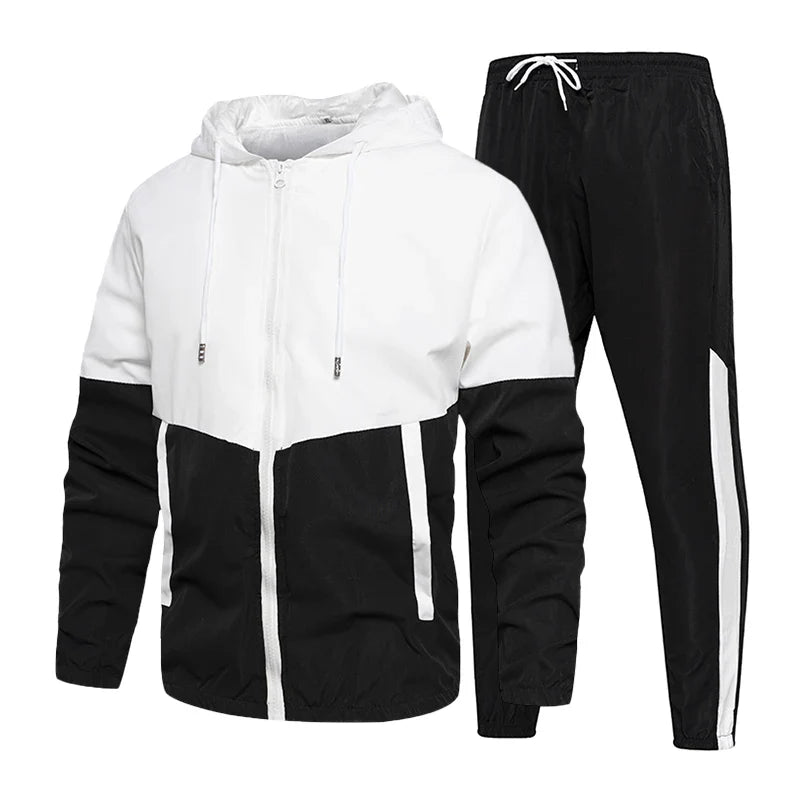 Black and white tracksuit with a jacket and pants on a white background