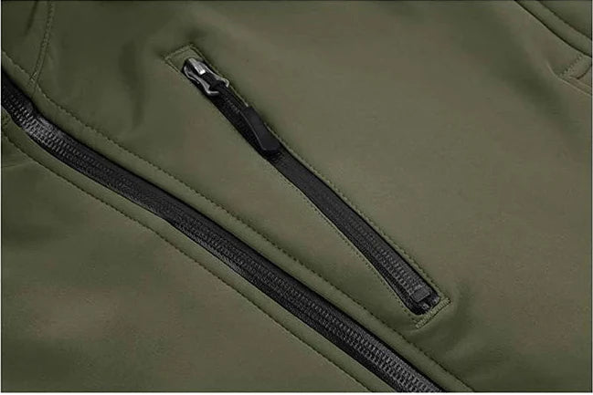 Close-up of a green jacket with a zipper on a white background