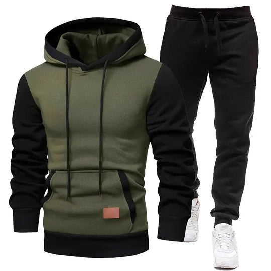 Green and black hoodie with matching pants on a white background