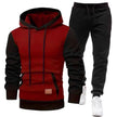 Red and black hoodie with matching pants on a white background