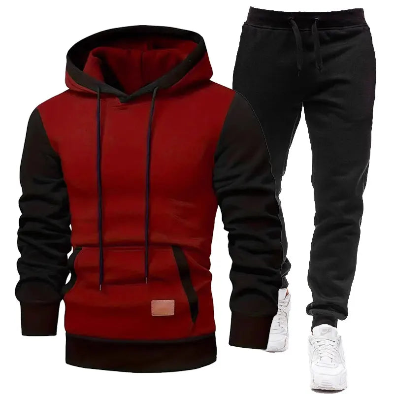 Red and black hoodie with matching pants on a white background