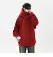 Person wearing a red hoodie on a white background