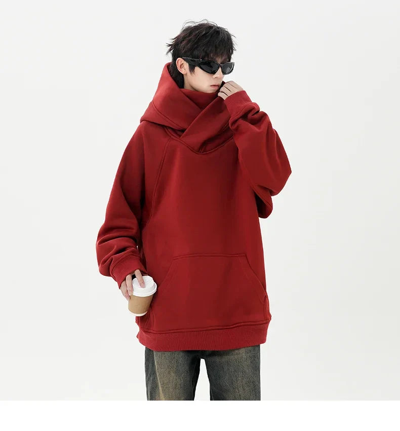 Person wearing a red hoodie on a white background